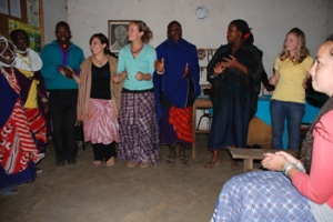 Valerie, Shannon and Anna dancing with the members of Aaang Sarian during our visit to Monduli Chini
